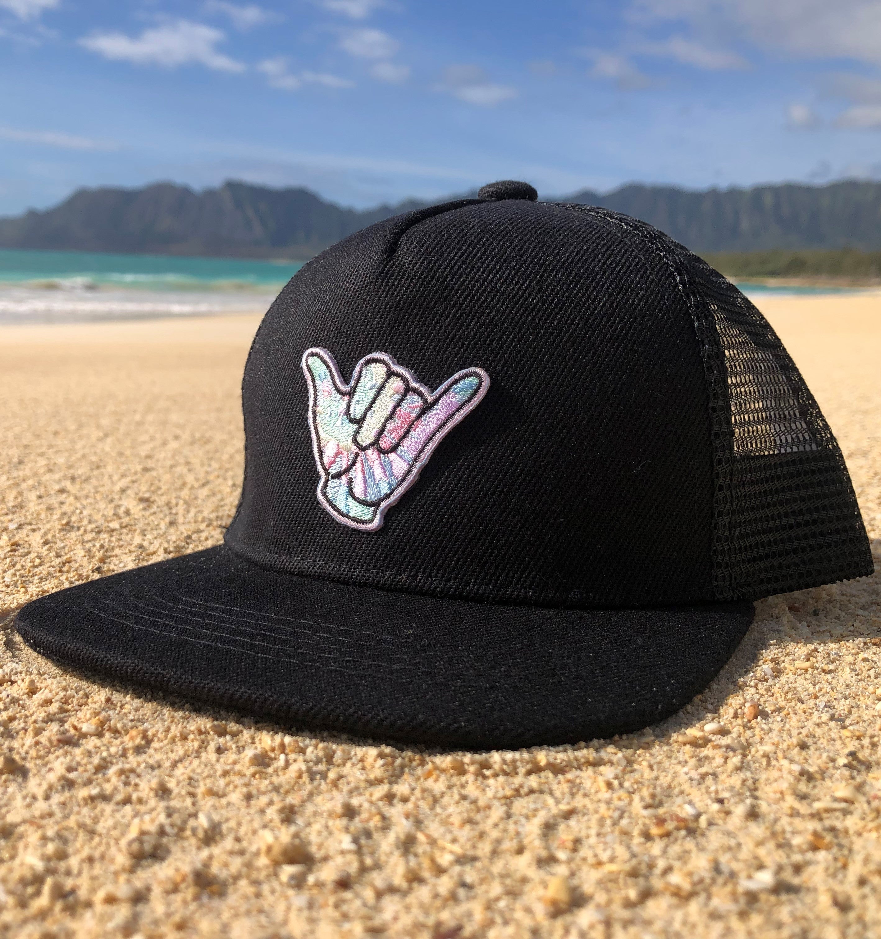 Hang loose trucker hat for toddlers on the beach in the sand by the ocean in Hawaii in the sun copy 1